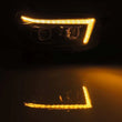 Load image into Gallery viewer, AlphaRex 10-13 Toyota 4Runner LUXX LED Proj Headlights Plank Style Black w/Seq Signal/DRL - Back View