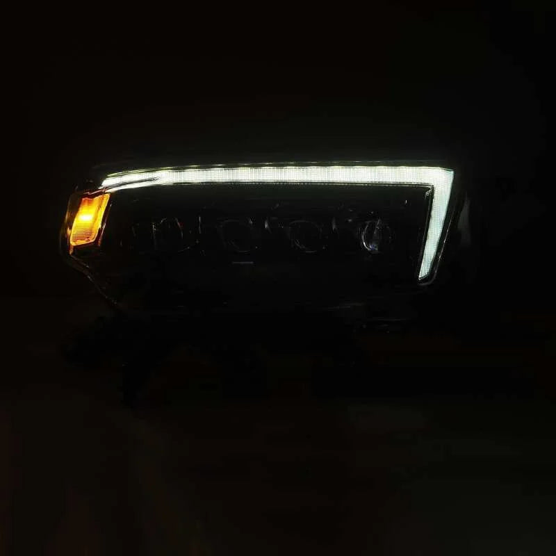 AlphaRex 10-13 Toyota 4Runner NOVA LED Proj Headlights Plank Style Alpha Black w/Seq Signal/DRL - Installation View