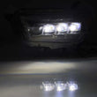 Load image into Gallery viewer, AlphaRex 10-13 Toyota 4Runner NOVA LED Projector Headlights Plank Style Black w/Seq Signal/DRL - Additional View 5