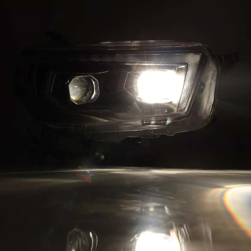 AlphaRex 10-13 Toyota 4Runner PRO-Series Projector Headlights Plank Style Black w/Seq Signal/DRL - Installation View