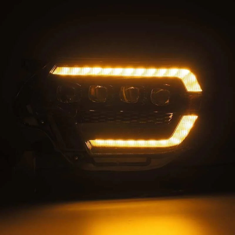 AlphaRex 12-15 Toyota Tacoma NOVA LED Proj Headlights Plank Style Black w/Activ Light/Seq Signal/DRL - Installation View