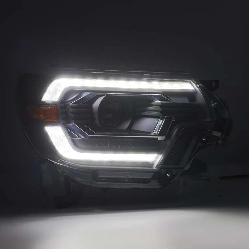 AlphaRex 12-15 Toyota Tacoma PRO-Series Projector Headlights Plank Style Alpha Black w/DRL - Back View