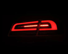 Load image into Gallery viewer, AlphaRex 12-21 Tesla Model S LUXX-Series LED Tail Lights - Black/Red - Back View