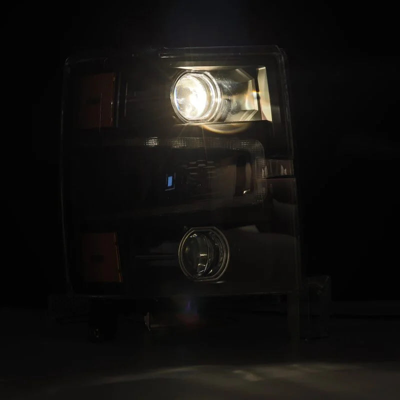 AlphaRex 14-15 Chevy 1500 PRO-Series Projector Headlights Black w/ Sequential Signal &  DRL - Installation View