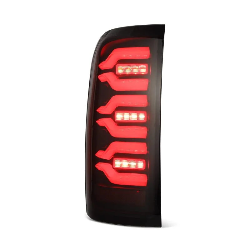 AlphaRex 14-18 Chevrolet Silverado Luxx-Series LED Tail Lights Black w/Activ Light/Seq Signal - Installation View