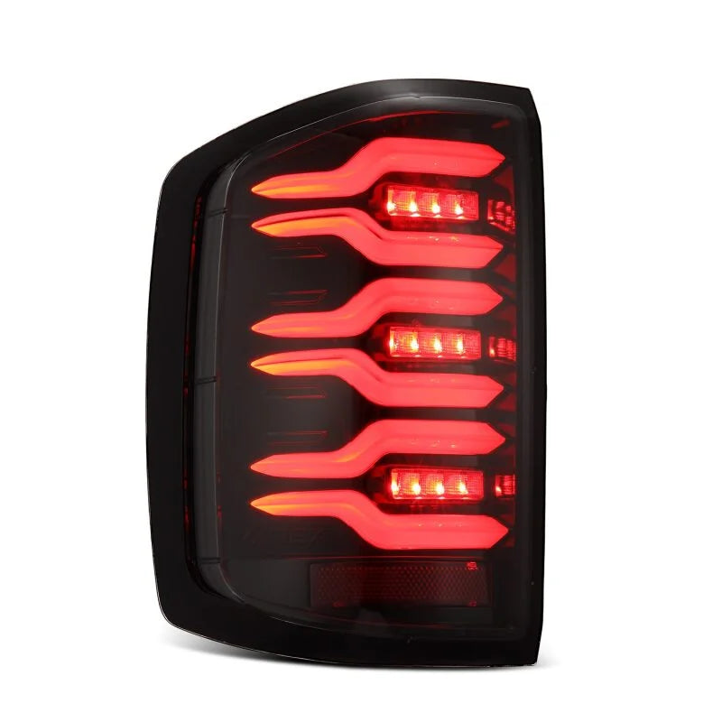 AlphaRex 14-18 Chevy Silverado 1500 Luxx-Series LED Tail Lights Alpha-Black w/Activ Light/Seq Signal - Side View