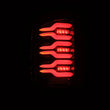 Load image into Gallery viewer, AlphaRex 14-18 Chevy Silverado 1500 Luxx-Series LED Tail Lights Alpha-Black w/Activ Light/Seq Signal - Back View