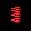 Load image into Gallery viewer, AlphaRex 14-18 Chevy Silverado 1500 Luxx-Series LED Tail Lights Black/Red w/Activ Light/Seq Signal - Side View