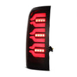 Load image into Gallery viewer, AlphaRex 14-18 Chevy Silverado 1500 Luxx-Series LED Tail Lights Black/Red w/Activ Light/Seq Signal - Additional View 7