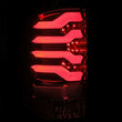 Load image into Gallery viewer, AlphaRex 14-18 GMC Sierra 1500 PRO-Series LED Tail Lights Red Smoke - Installation View
