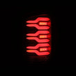 Load image into Gallery viewer, AlphaRex 14-18 GMC Sierra 1500/2500HD/3500HD LUXX-Series LED Tail Lights Blk w/Actv Light &amp; Seq. Sig - Side View