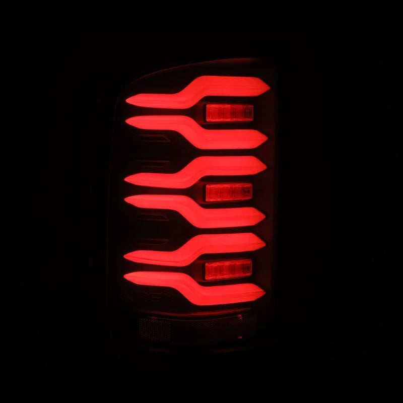 AlphaRex 14-18 GMC Sierra 1500/2500HD/3500HD LUXX-Series LED Tail Lights Blk w/Actv Light & Seq. Sig - Additional View 7