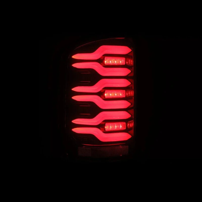 AlphaRex 14-18 GMC Sierra 1500/2500HD/3500HD LUXX-Series LED Tail Lights Blk/Red w/Actv Lgt Seq. Sig - Back View