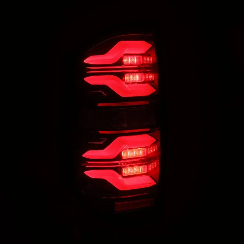 AlphaRex 14-21 Toyota Tundra LUXX LED Taillights Black/Red w/Activ Light/Seq Signal - Detail View