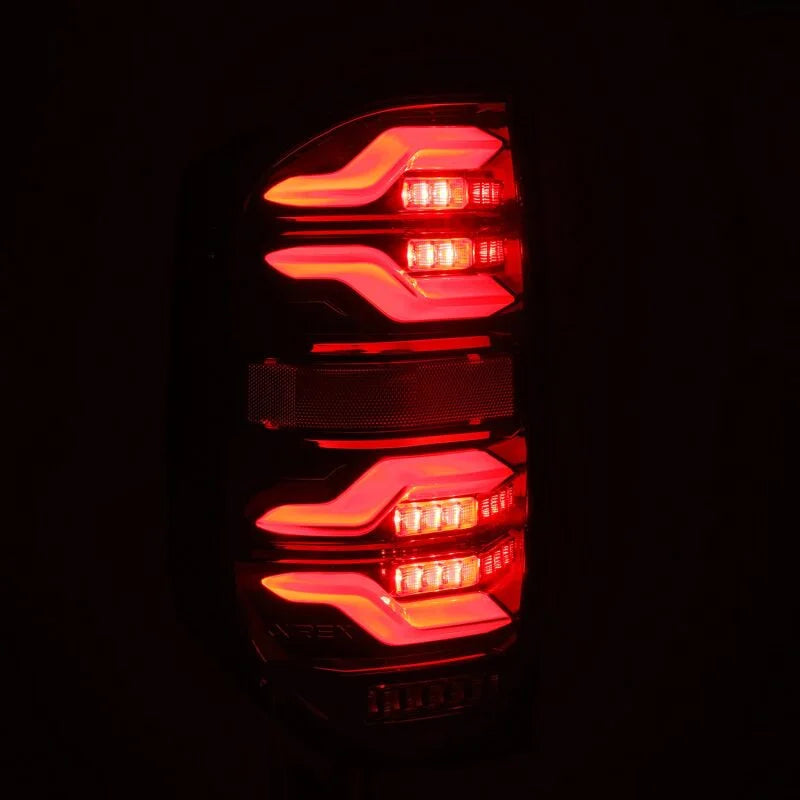 AlphaRex 14-21 Toyota Tundra LUXX LED Taillights Blk w/Activ Light/Seq Signal - Installation View
