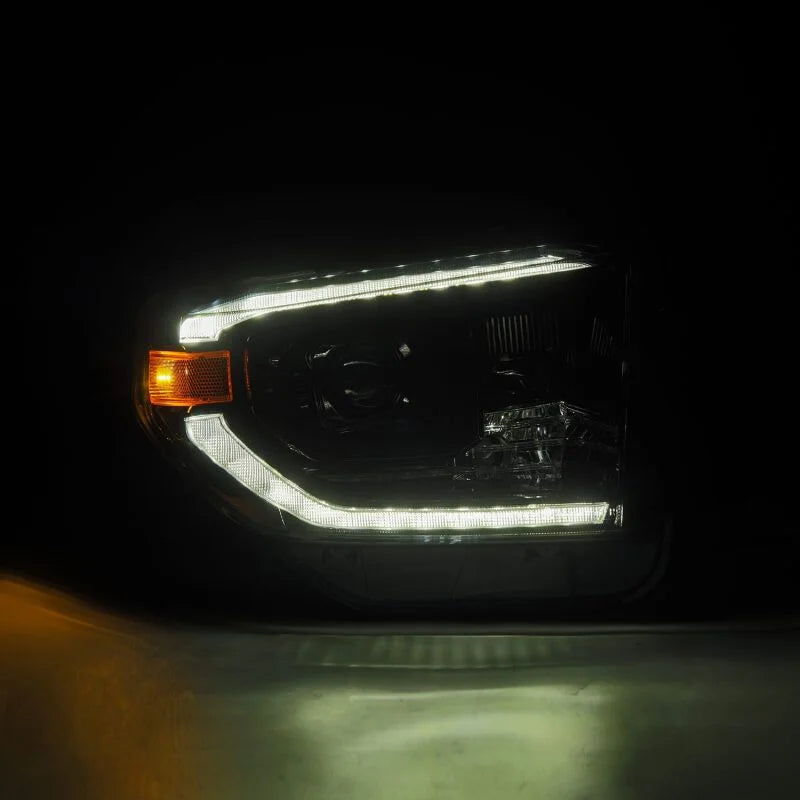 AlphaRex 14-21 Toyota Tundra LUXX-Series LED Proj Headlights Alpha-Blk w/Actv Light & Seq. Sig + DRL - Installation View