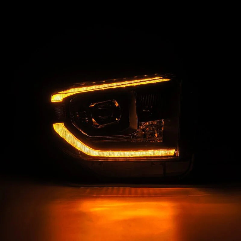AlphaRex 14-21 Toyota Tundra LUXX-Series LED Proj Headlights Blk w/Actv Light & Seq. Sig + DRL - Side View