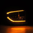 Load image into Gallery viewer, AlphaRex 14-21 Toyota Tundra NOVA-Series LED Proj Headlights Blk w/Actv Light &amp; Seq. Sig + DRL - Installation View