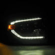 Load image into Gallery viewer, AlphaRex 14-21 Toyota Tundra PRO-Series Projector Headlights Black w/Seq. Sig. + DRL - Back View