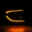 Load image into Gallery viewer, AlphaRex 14-21 Toyota Tundra PRO-Series Projector Headlights Black w/Seq. Sig. + DRL - Installation View