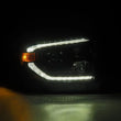 Load image into Gallery viewer, AlphaRex 14-21 Toyota Tundra PRO-Series Projector Headlights Black w/Seq. Sig. + DRL - Back View
