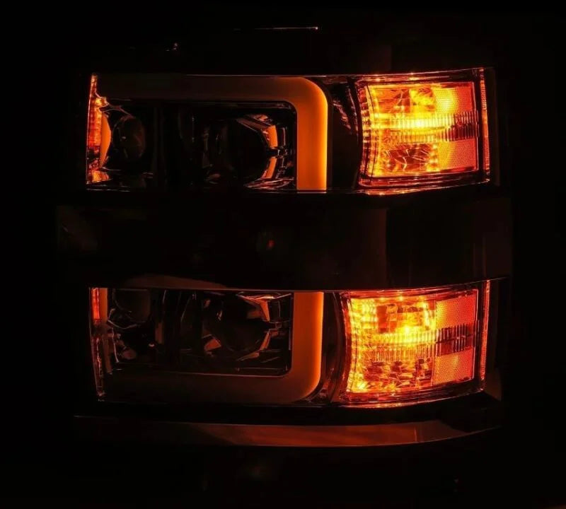 AlphaRex 15-19 Chevy Silverado 2500/3500 LUXX-Series Proj. Headlights Blk w/Actv SeqSig & SBDRL - Side View