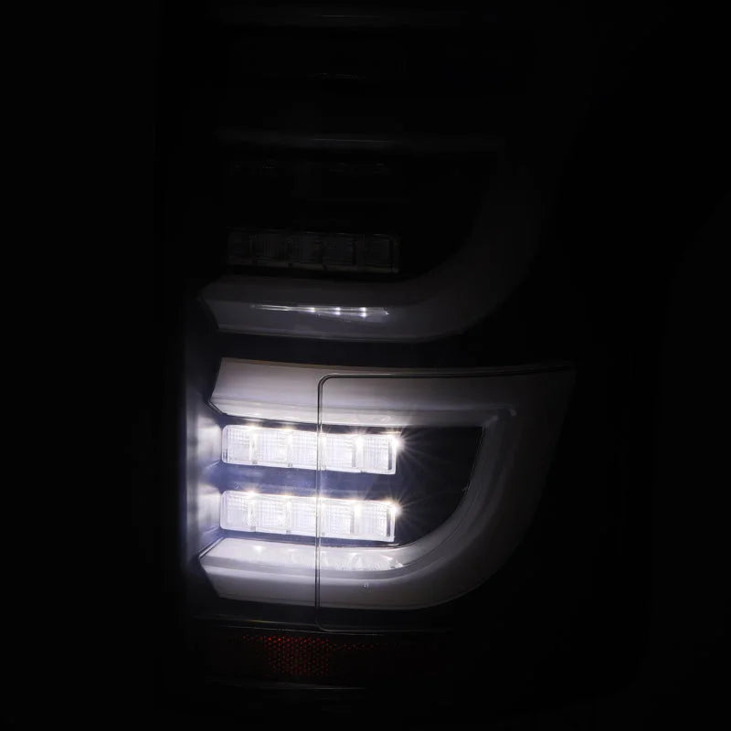 AlphaRex 15-20 Ford F150 Luxx-Series LED Tail Lights Alpha-Black - Side View