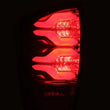 Load image into Gallery viewer, AlphaRex 16-20 Toyota Tacoma PRO-Series LED Tail Lights Red Smoke - Installation View