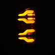 Load image into Gallery viewer, AlphaRex 16-21 Toyota Tacoma LUXX LED Taillights Alpha Blk w/Activ Light/Seq Signal - Installation View