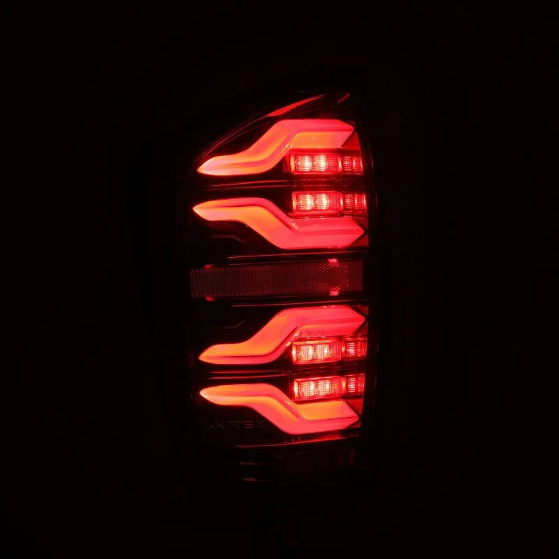 AlphaRex 16-21 Toyota Tacoma LUXX LED Taillights Alpha Blk w/Activ Light/Seq Signal - Additional View 5