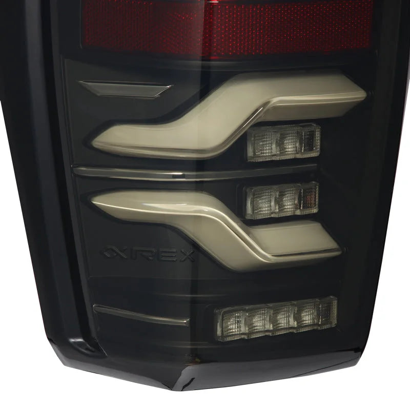 AlphaRex 16-21 Toyota Tacoma LUXX LED Taillights Blk w/Activ Light/Seq Signal - Side View