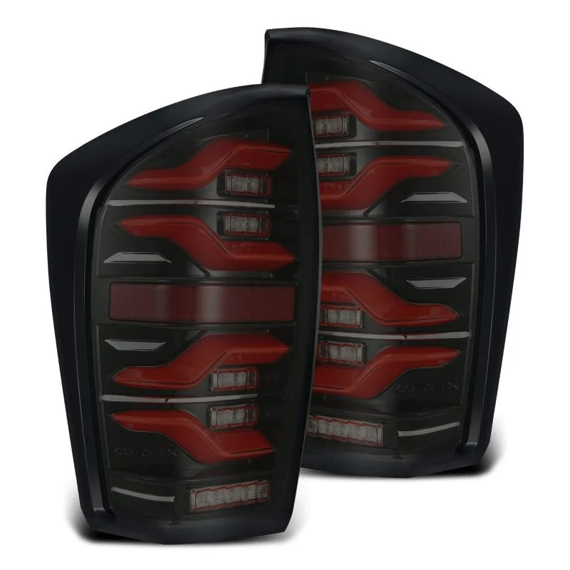 AlphaRex 16-21 Toyota Tacoma LUXX LED Taillights Blk/Red w/Activ Light/Seq Signal - Side View