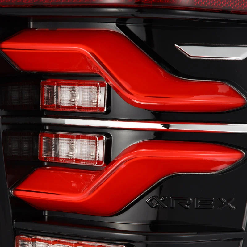 AlphaRex 16-21 Toyota Tacoma LUXX LED Taillights Blk/Red w/Activ Light/Seq Signal - Installation View