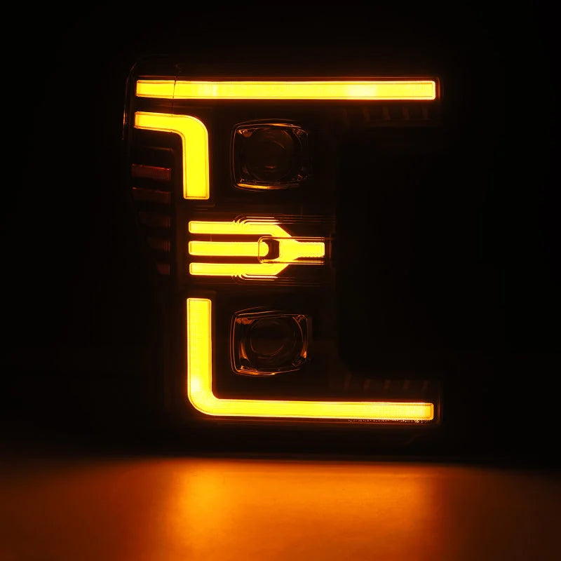 AlphaRex 17-19 Ford F-250/350/450/550 Super Duty LUXX-Series LED Proj Headlights Blk w/SS & SBDRL - Installation View