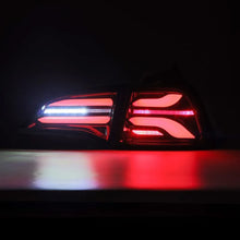Load image into Gallery viewer, AlphaRex 17-22 Tesla Model 3 PRO-Series LED Tail Lights Jet Black w/Seq Sig - Installation View