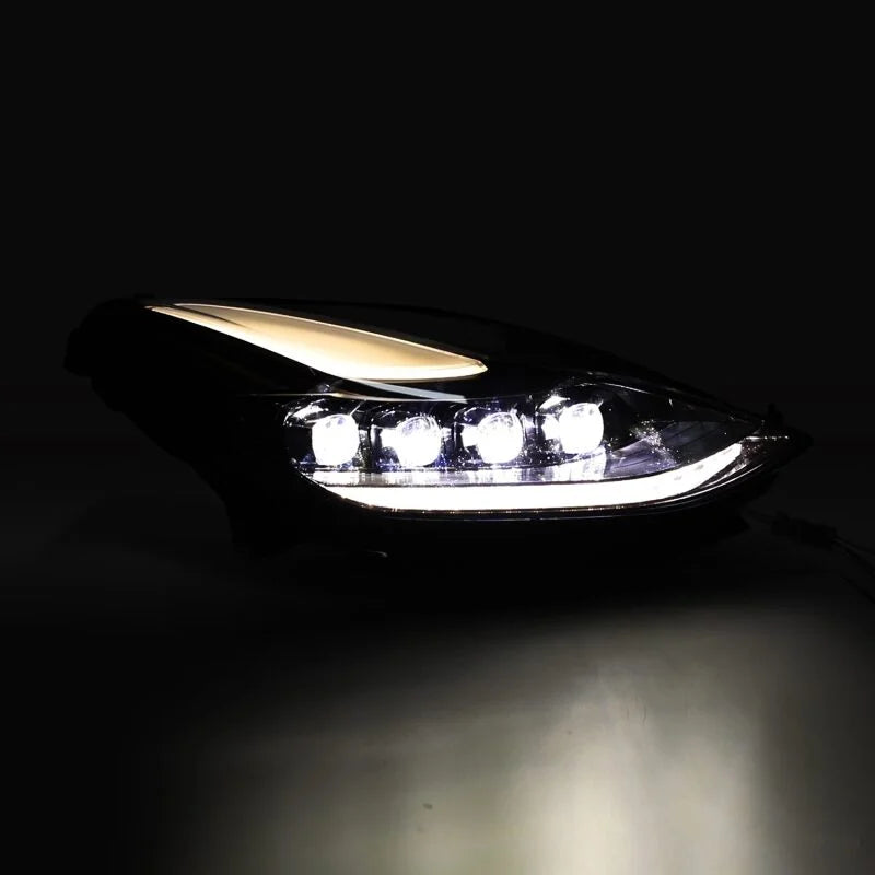 AlphaRex 17-22 Tesla Model 3/20-23 Model Y NOVA LED Proj Headlights Alpha-Blk w/Actv Lgt & Seq.Sig - Side View