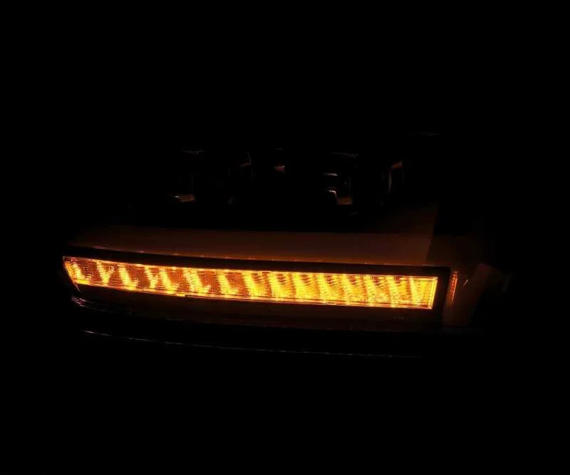 AlphaRex 19-20 Dodge Ram 1500 LUXX LED Proj Headlights Plank Jet Blk w/Activ Light/Seq Signal/DRL - Back View
