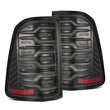 Load image into Gallery viewer, AlphaRex 19-21 Dodge Ram 1500 Luxx-Series LED Tail Lights Alpha-Black w/Activ Light/Seq Signal - Side View