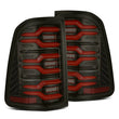 Load image into Gallery viewer, AlphaRex 19-21 Dodge Ram 1500 Luxx-Series LED Tail Lights Black/Red w/Activ Light/Seq Signal - Main Product View