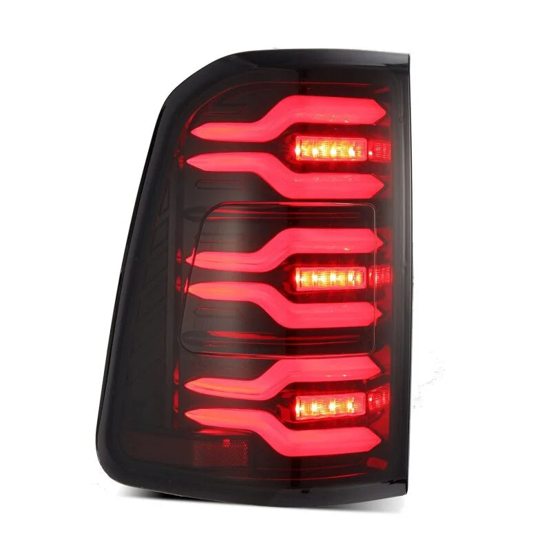 AlphaRex 19-21 Dodge Ram 1500 Luxx-Series LED Tail Lights Black/Red w/Activ Light/Seq Signal - Back View
