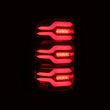 Load image into Gallery viewer, AlphaRex 19-21 Dodge Ram 1500 Luxx-Series LED Tail Lights Black/Red w/Activ Light/Seq Signal - Installation View