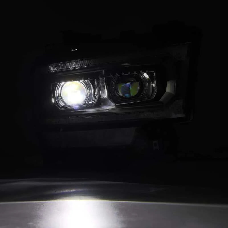 AlphaRex 19-21 Ram 2500 LUXX LED Proj Headlights Plank Style Black w/Activ Light/Seq Signal/DRL - Installation View