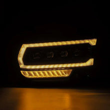 Load image into Gallery viewer, AlphaRex 19-21 Ram 2500 NOVA LED Proj Headlights Plank Style Alpha Blk w/Activ Light/Seq Signal/DRL - Side View