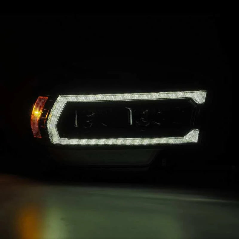 AlphaRex 19-21 Ram 2500 PRO-Series Projector Headlights Plank Style Alpha Black w/Activation Light - Installation View