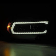 Load image into Gallery viewer, AlphaRex 19-21 Ram 2500 PRO-Series Projector Headlights Plank Style Alpha Black w/Activation Light - Installation View