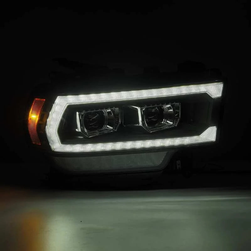AlphaRex 19-21 Ram 2500 PRO-Series Projector Headlights Plank Style Black w/Activation Light - Side View