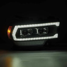 Load image into Gallery viewer, AlphaRex 19-21 Ram 2500 PRO-Series Projector Headlights Plank Style Black w/Activation Light - Side View
