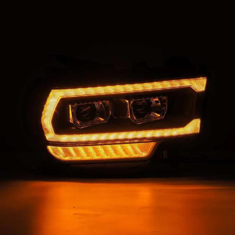 AlphaRex 19-21 Ram 2500 PRO-Series Projector Headlights Plank Style Black w/Activation Light - Installation View