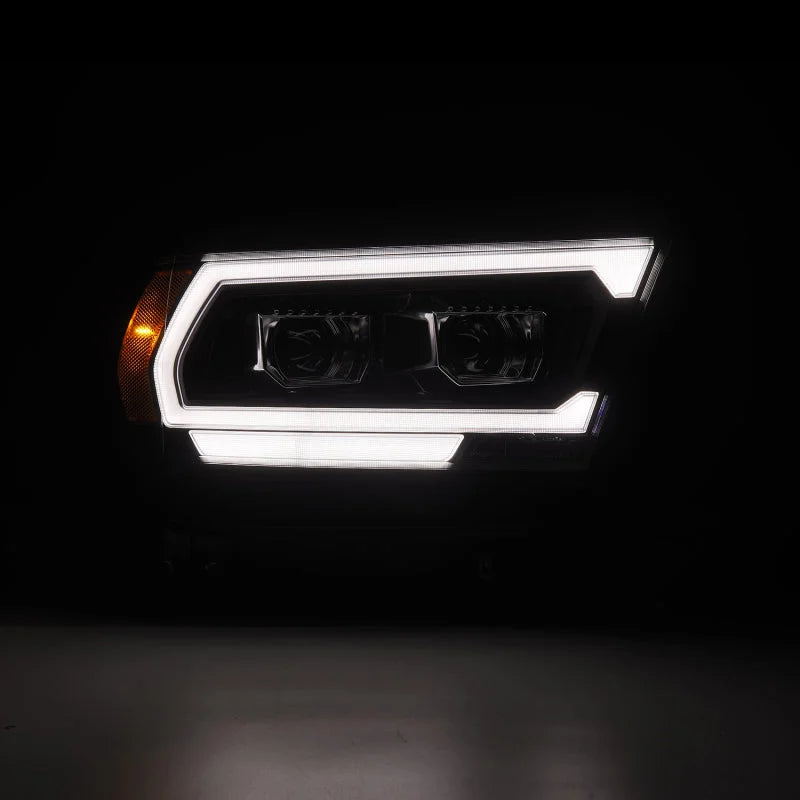 AlphaRex 19-22 Dodge Ram 1500 PRO-Series Projector Headlights Black w/Seq Signal/DRL - Back View