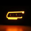 Load image into Gallery viewer, AlphaRex 19-22 Dodge Ram 1500 PRO-Series Projector Headlights Black w/Seq Signal/DRL - Installation View